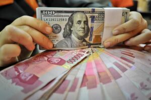 Rupiah Menurun ke 15.633 per Dolar AS Pada Akhir Pekan